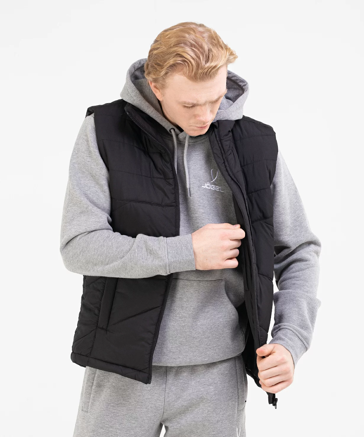 Фото Жилет утепленный ESSENTIAL Padded Vest, черный Jögel со склада магазина Спортев
