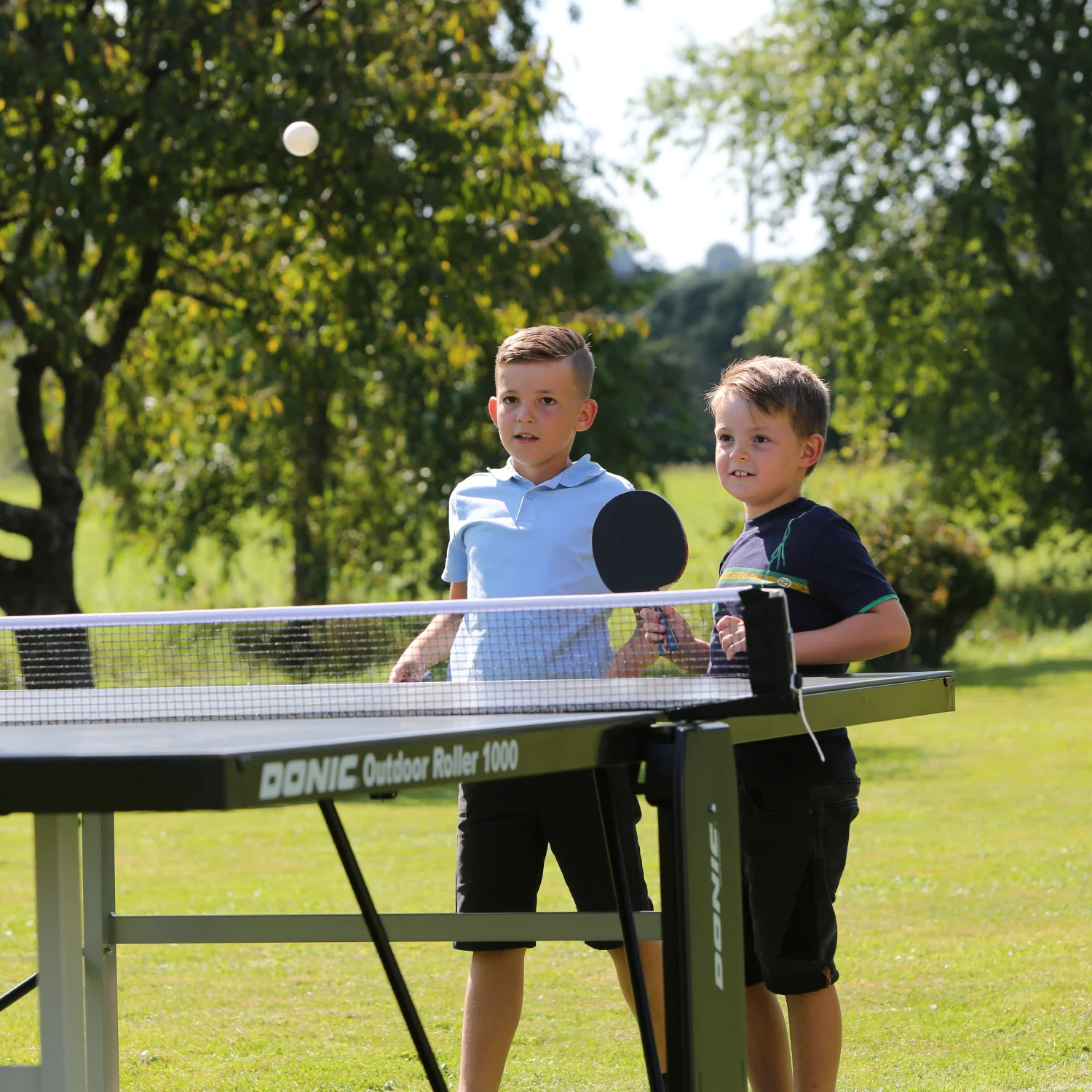 Фото Теннисный стол DONIC OUTDOOR ROLLER 1000 BLUE 230291-B со склада магазина Спортев