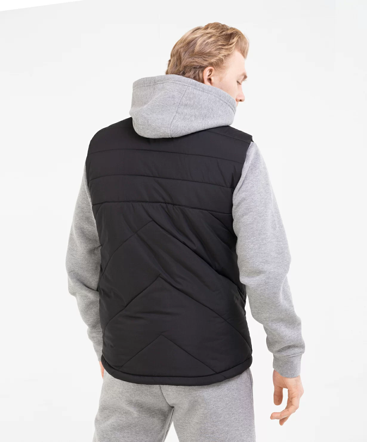 Фото Жилет утепленный ESSENTIAL Padded Vest, черный Jögel со склада магазина Спортев
