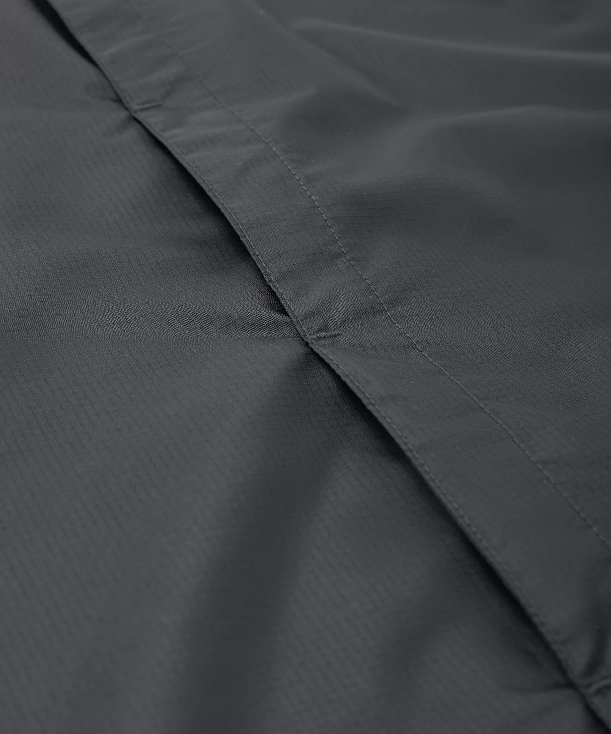 Фото Куртка ветрозащитная DIVISION PerFormPROOF Shower Jacket, черный Jögel со склада магазина СпортЕВ