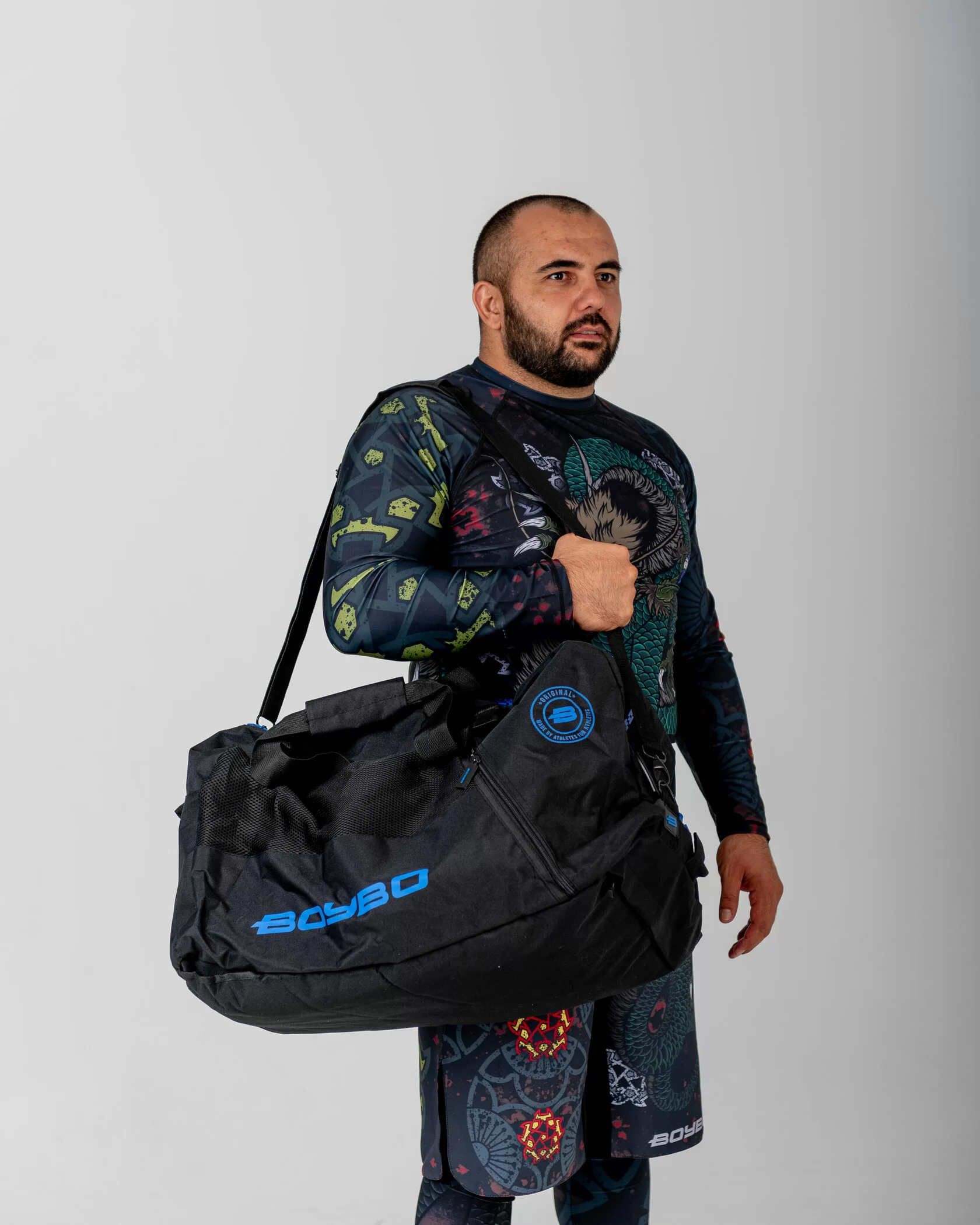 Фото Сумка-рюкзак трансформер BoyBo MMA 53х25х25 см черный BS-005 со склада магазина СпортЕВ