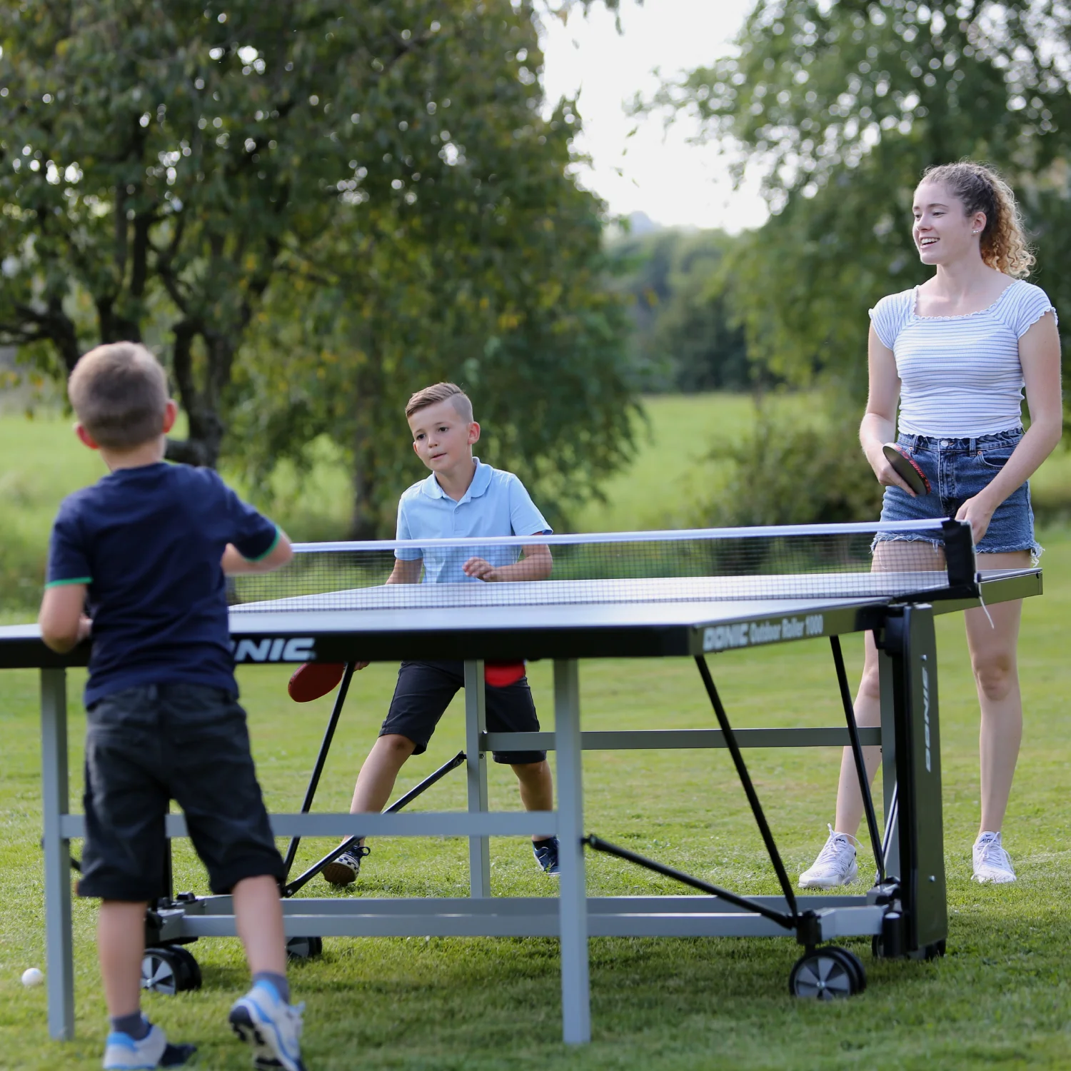 Фото Теннисный стол DONIC OUTDOOR ROLLER 1000 BLUE 230291-B со склада магазина Спортев