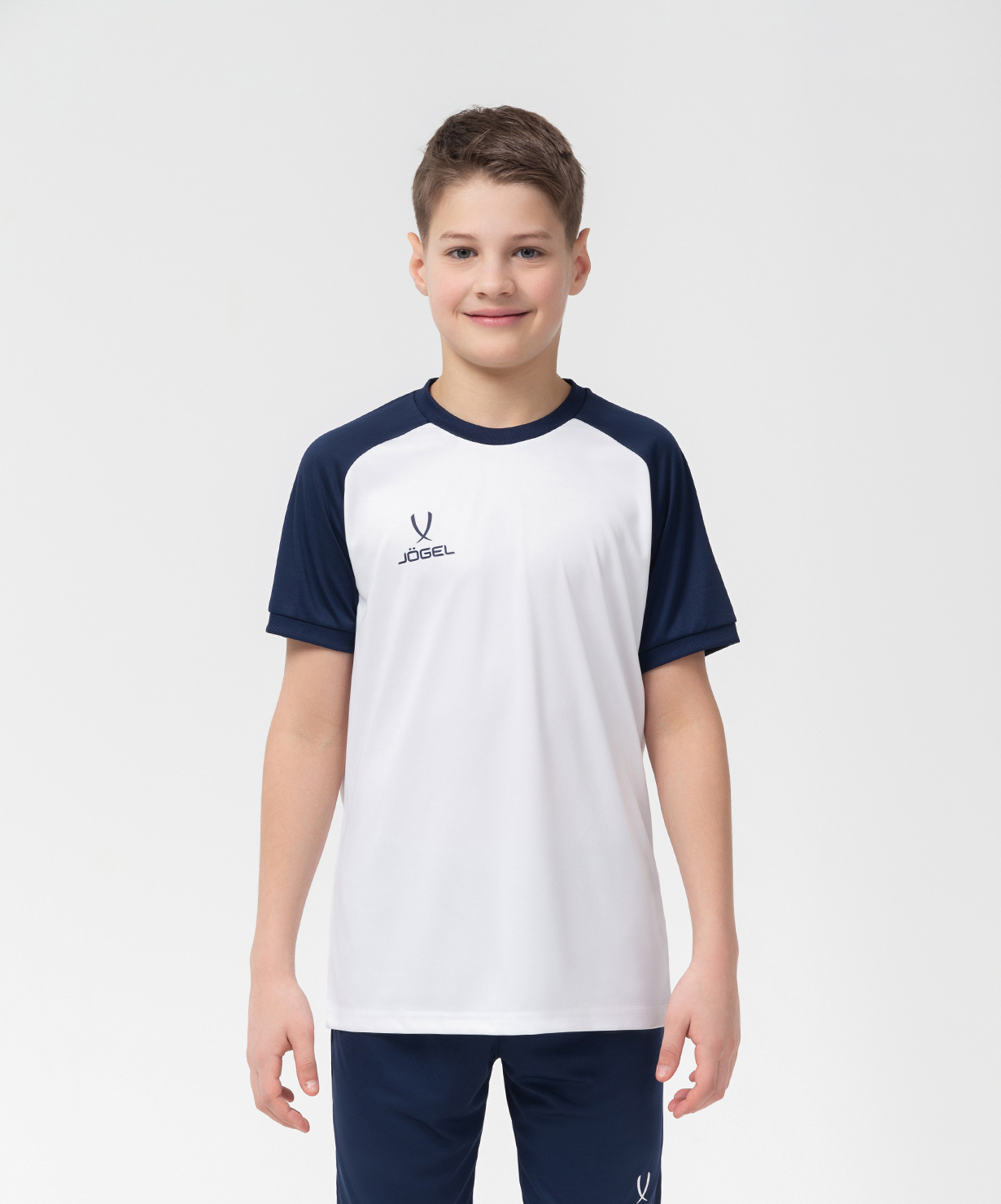 Фото Футболка игровая JOGEL CAMP Reglan Jersey, белый/темно-синий, детский со склада магазина Спортев