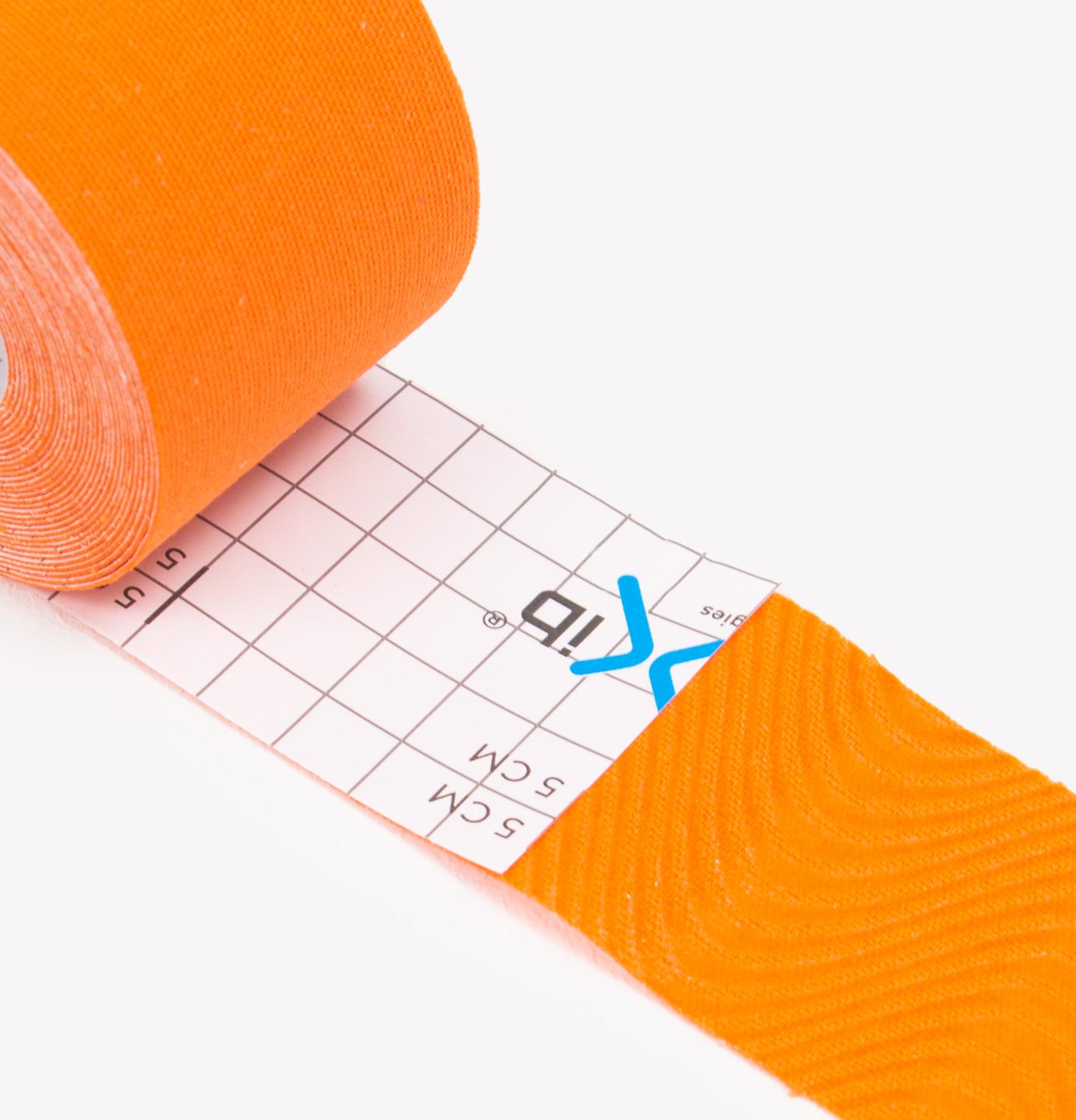 Фото Тейп Кинезио Kinexib Pro 5 м * 5 см оранжевый 27222 со склада магазина Спортев