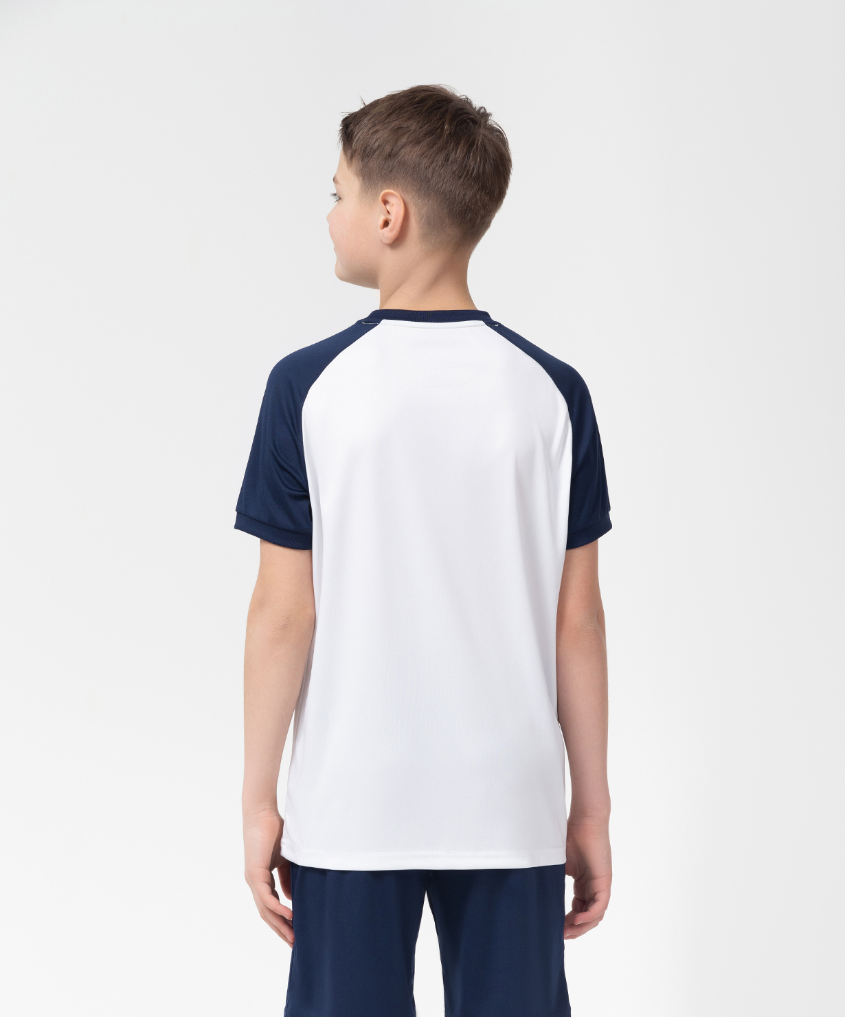Фото Футболка игровая JOGEL CAMP Reglan Jersey, белый/темно-синий, детский со склада магазина Спортев